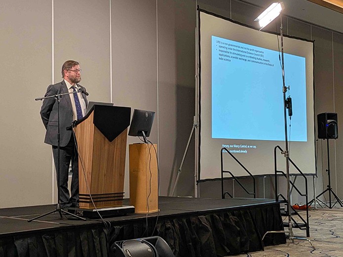 Dr. Ari Sihvola, President of URSI, addresses the attendees during the plenary session.